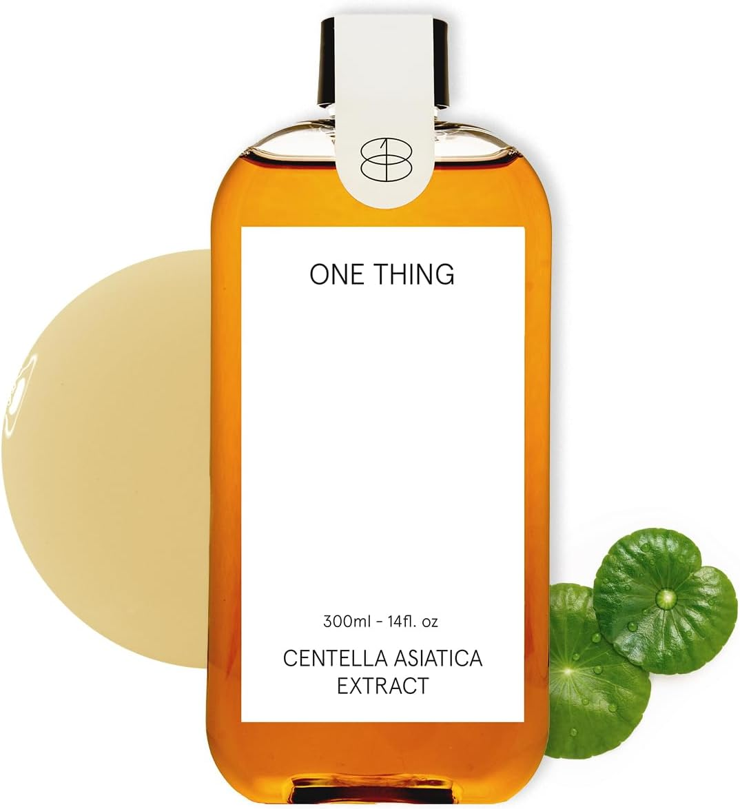 透明なオレンジ色のボトルに「ONE THING」とラベルがあり、背景に緑色の葉。液体は300ml、色は琥珀色。情緒はシンプル。